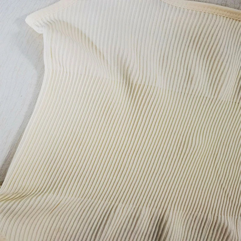 Guldia | Geribbelde buikjumpsuit - Willemijnswinkel